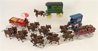 Four Cast Iron Horse Drawn Buggies w/ Teamsters