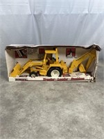 ERTL International tractor loader backhoe, new in