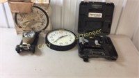Trademan nail gun, clock, Jim Beam decanter