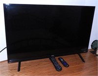 Lot #2006 - TCL 32” flat screen TV with remote