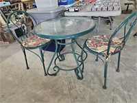 Glass top Wrought-iron table and chairs