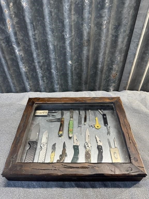 wood showcase and knife collection