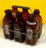 6 Vintage Amber Milk Bottles in Carrier