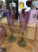Pair of pink and green wine glasses