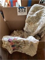 Box of doilies, runners, blanket, tapestry scarf