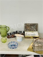 assorted housewares, leather belts, cutlery