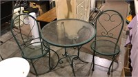 Metal and glass patio table with two chairs 29