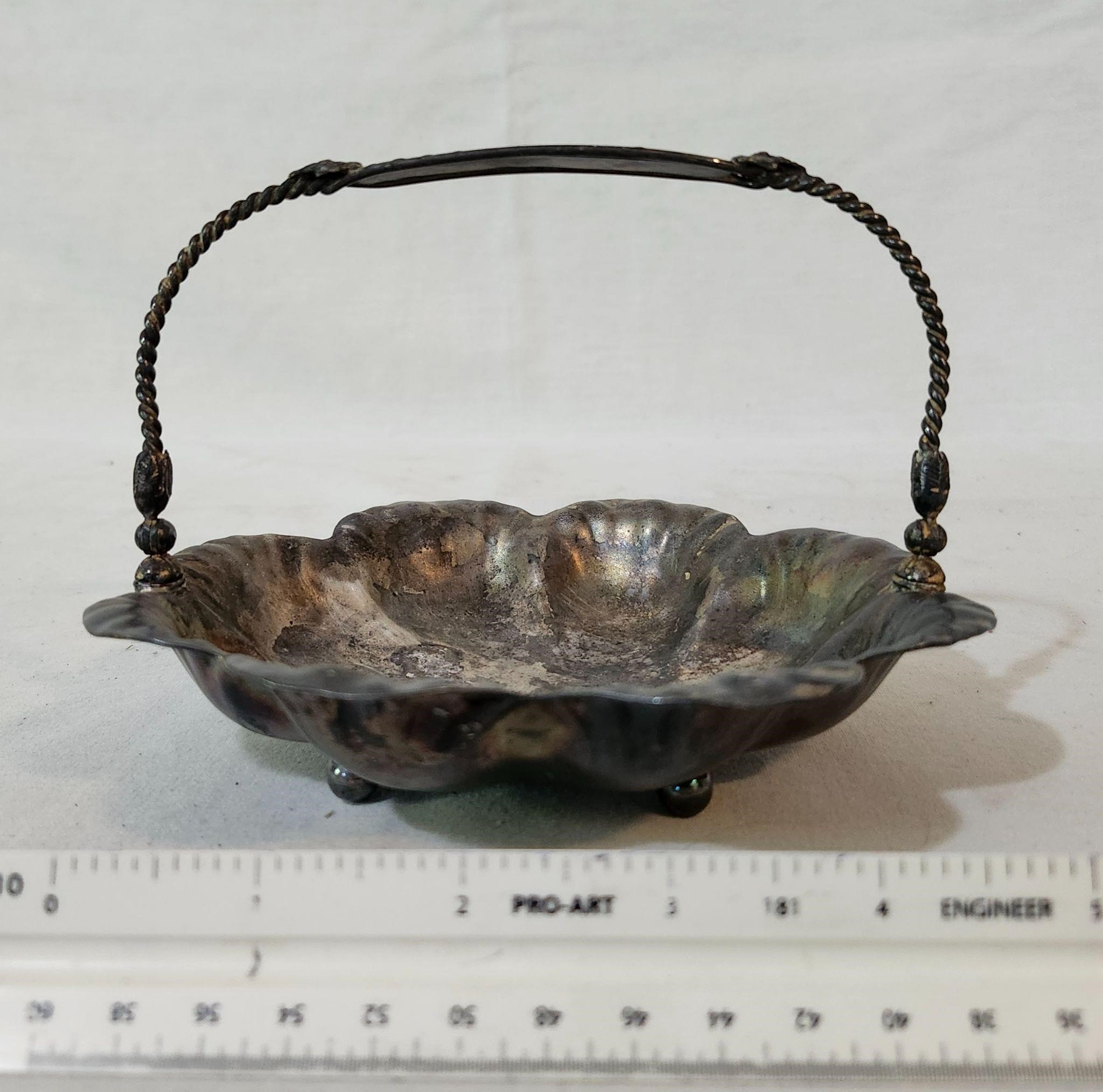 Silver quadruple footed basket plate