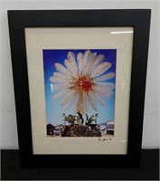 Framed Burning Man plastic daisy photo