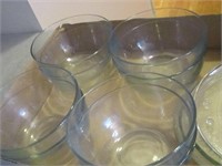 Clear glass bowls, plates and