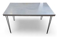 Laminated Table with Hairpin Legs.