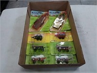 assortment of 1/64 scale implements