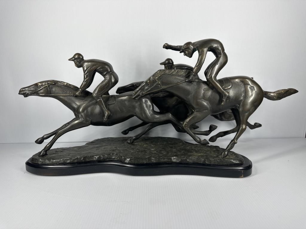 A Metal Race Horse Sculpture 24”Long