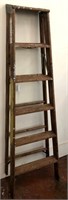 Wood Ladder. Looks like it was a painter's Ladder!
