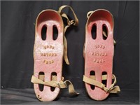 Pair of vintage cast iron York health shoes