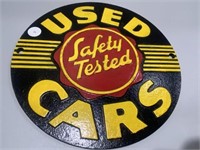 Cast iron used cars sign measures over 9 inches