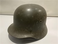 M40 WWII German rolled rim war helmet with liner