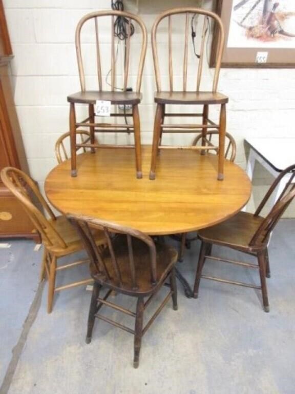 48" Table w/ Iron Base & (7) Bow Back Chairs