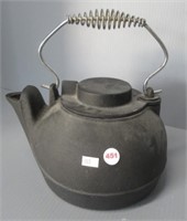 Cast iron campfire pot. Measures: 6.25" Tall.