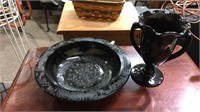 Black glass console bowl and two handled vase,