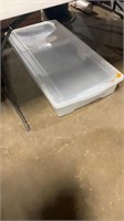Long, flat, empty tote with lid