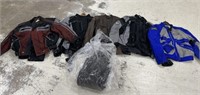 Large Group of Motorcycle Jackets and Pants