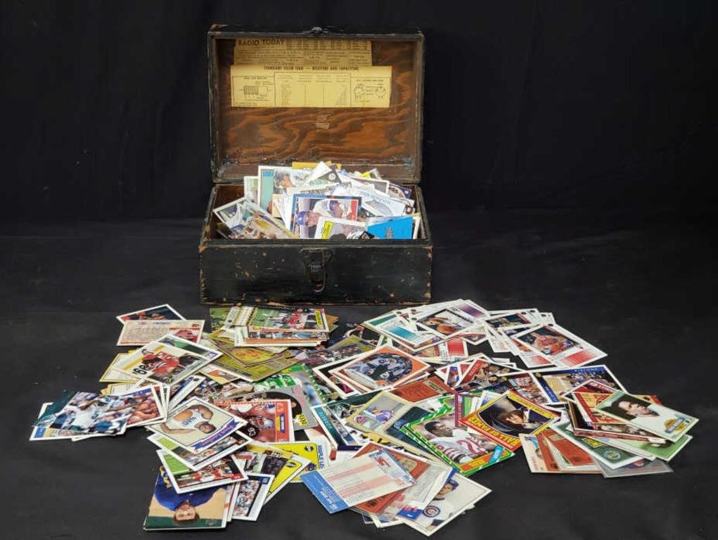 Group of vintage sports cards in wooden hinged