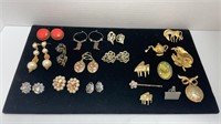 Assortment of broaches & earrings