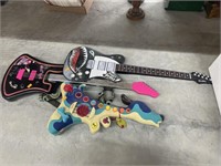Child’s guitar items