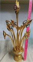 Decorative golden wood flowers in vase