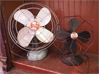 Two vintage electric fans, one 12" high marked