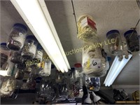 Containers hanging from ceiling, tools, misc.