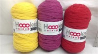 D2) (3) SKEINS HOOKED YARN-YELLOW, PURPLE & RED