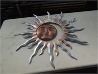 Metal sun & moon wall art