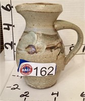 POTTERY PITCHER, SIGNED