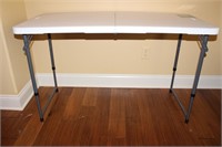 4 Foot Adjustable Height Fold-In-Half Table #1