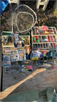 Fishing tackle boxes full, flies, and nets