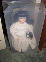 Doll in white dress