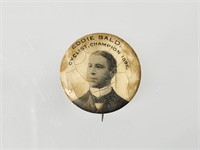 EARLY CELLULOID EDDIE BALD CYCLIST CHAMPION PIN