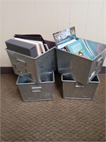 Lot includes for metal buckets or drawers.  Books