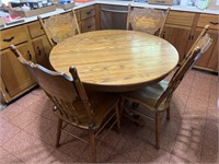 Vintage oak claw foot table and (4) chairs 42?