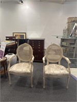 Pair of white upholstered armchairs