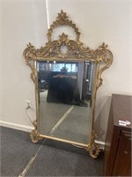 Ornate gold mirror