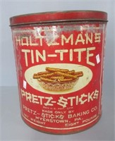 Vintage 10.75" tall pretzel stick lidded tin.