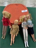 5 Barbies w/ case of Misc. Clothing