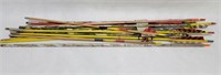 22 ASSORTED ARROW SHAFTS AND 3 BOWS