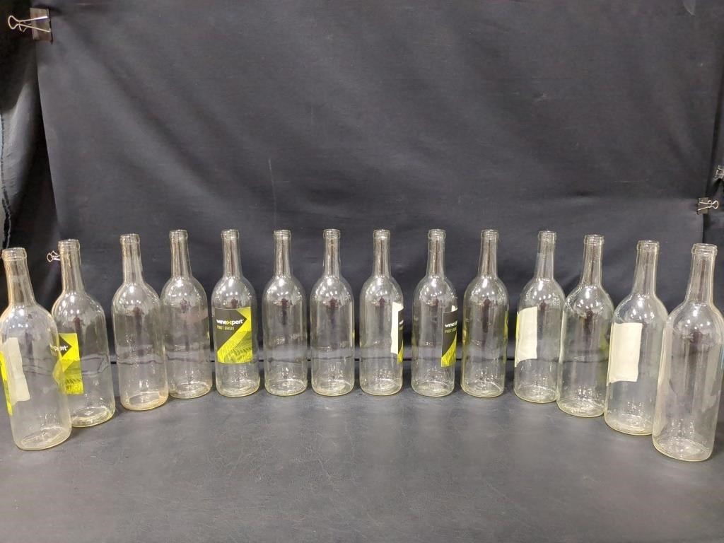 14 clear wine bottles