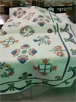 Handmade appliqued quilt