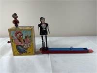 Vintage circus monkey toy and kazoo toy