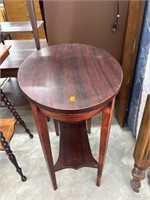 Antique stand with tapered legs